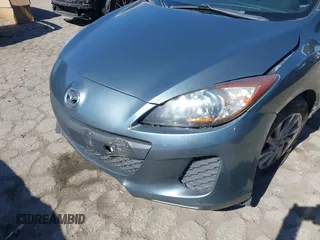 2012 Mazda 3 i Touring with VIN JM1BL1L89C1577535, listed as a IAAI auction lot 41631335 with 82,984 mi miles and . Bid and sale history available at DreamBid. Image 6.