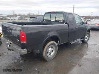 2000 Ford F-150 XL with VIN 1FTRX18W9YNA63551, listed as a IAAI auction lot 41446703 with 1 mi miles. Bid and sale history available at carsss.com. Image 4.