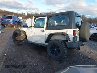 2015 Jeep Wrangler Sport with VIN 1C4AJWAG0FL516351, listed as a IAAI auction lot 41178594 with 49,700 mi miles and . Bid and sale history available at DreamBid. Image 3.