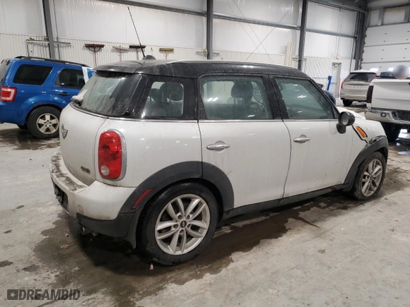 2013 MINI Cooper Countryman with VIN WMWZB3C55DWM31248, listed as a Copart auction lot 45503555 with 143,483 mi miles and Salvage Title. Bid and sale history available at carsss.com. Image 3.