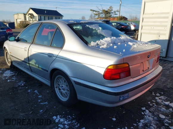 1999 BMW 5 Series 528iA with VIN WBADM6336XBY31254, listed as a IAAI auction lot 41408089 with 221,176 mi miles. Bid and sale history available at carsss.com. Image 3.