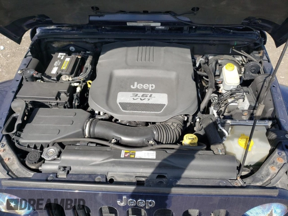 2013 Jeep Wrangler Sahara with VIN 1C4AJWBG3DL516842, listed as a Copart auction lot 49246065 with 129,594 mi miles and Salvage title. Bid and sale history available at DreamBid. Image 12.