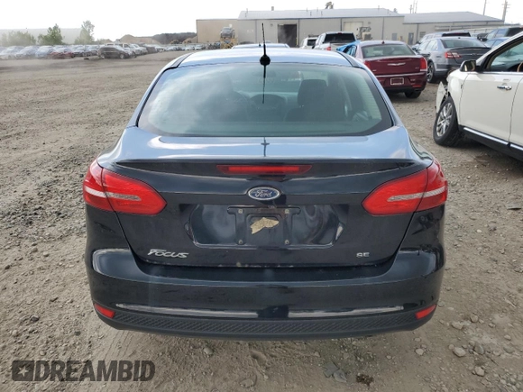 2017 Ford Focus SE z VIN 1FADP3F29HL291329, wystawiony jako Copart lot #58964155 z przebiegiem 102 506 mil mil oraz Czysty tytuł • Clean title. Historia ofert i sprzedaży dostępna na DreamBid. Obrazek 6.