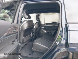 2023 Jeep Grand Cherokee Overland with VIN 1C4RJHDG8P8822650, listed as a IAAI auction lot 42145252 with 63,100 mi miles and . Bid and sale history available at DreamBid. Image 8.