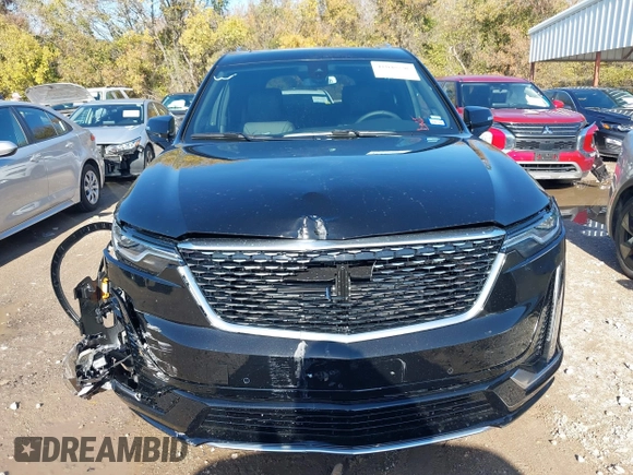 2025 Cadillac XT6 FWD Premium Luxury with VIN 1GYKPCRS1SZ118772, listed as a IAAI auction lot 41048190 with 131 mi miles. Bid and sale history available at carsss.com. Image 12.