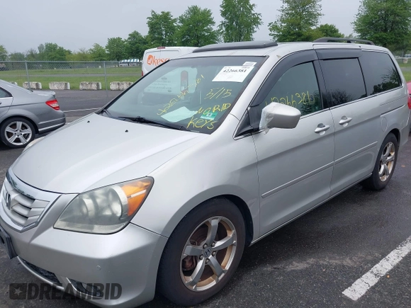 2009 Honda Odyssey Touring with VIN 5FNRL38859B029714, listed as a IAAI auction lot 42266381 with 196,747 mi miles and . Bid and sale history available at DreamBid. Image 12.