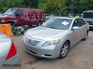 2007 Toyota Camry CE with VIN 4T1BE46K77U140703, listed as a IAAI auction lot 40193348 with 183,987 mi miles. Bid and sale history available at carsss.com. Image 2.