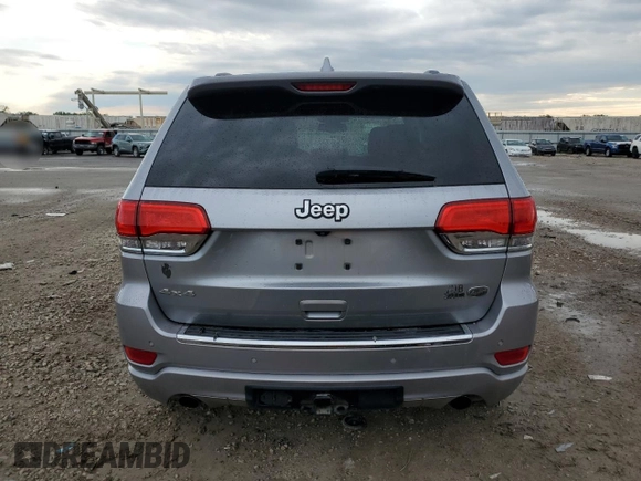 2015 Jeep Grand Cherokee High Altitude with VIN 1C4RJFCG2FC196563, listed as a Copart auction lot 56302315 with 143,759 mi miles and Salvage title. Bid and sale history available at DreamBid. Image 6.