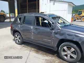 2016 Jeep Compass High Altitude Edition with VIN 1C4NJDEB0GD558230, listed as a IAAI auction lot 39799941 with 57,002 mi miles. Bid and sale history available at carsss.com. Image 16.