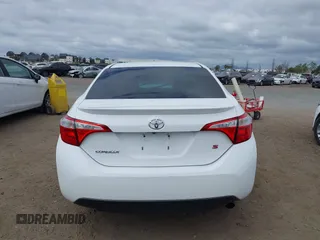 2014 Toyota Corolla L with VIN 5YFBURHE2EP085339, listed as a IAAI auction lot 42121009 with 122,339 mi miles and . Bid and sale history available at DreamBid. Image 17.