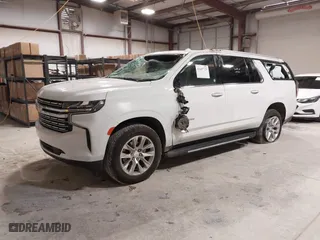 2023 Chevrolet Suburban Premier with VIN 1GNSCFKD8PR299995, listed as a IAAI auction lot 41607729 with 64,549 mi miles. Bid and sale history available at carsss.com. Image 2.