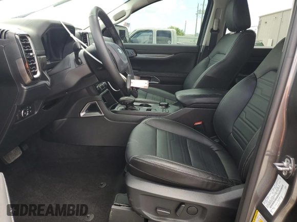 2024 Ford Ranger Lariat with VIN 1FTER4KH3RLE10731, listed as a Copart auction lot 60604675 with 8,566 mi miles and Salvage title. Bid and sale history available at DreamBid. Image 7.