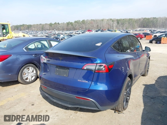 2022 Tesla Model Y Performance with VIN 7SAYGDEF7NF497076, listed as a IAAI auction lot 41759793 with 46,970 mi miles and . Bid and sale history available at DreamBid. Image 4.