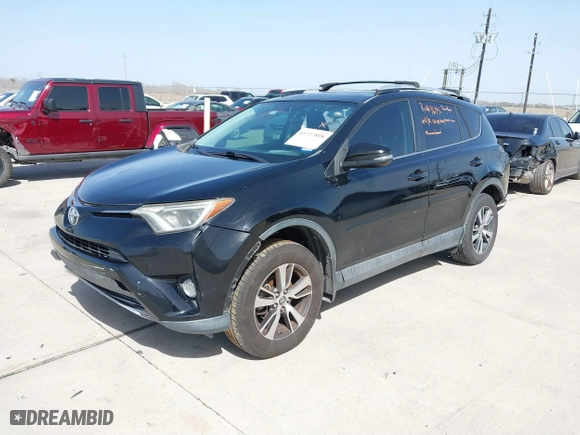 2016 Toyota RAV4 XLE with VIN 2T3WFREV9GW292772, listed as a IAAI auction lot 41727898 with 117,922 mi miles. Bid and sale history available at carsss.com. Image 17.