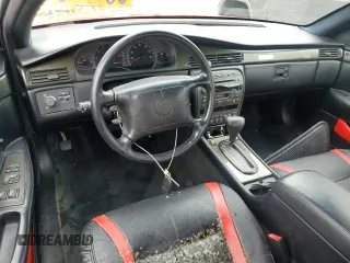 2002 Cadillac Eldorado z VIN 1G6EC129X2B106142, wystawiony jako Copart lot #74424164 z przebiegiem Nie podano mil oraz Szkody całkowita. Historia ofert i sprzedaży dostępna na DreamBid. Obrazek 8.