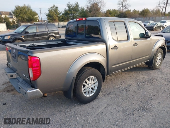 2018 Nissan Frontier PRO-4X with VIN 1N6AD0EV3JN772734, listed as a IAAI auction lot 41781146 with 74,760 mi miles. Bid and sale history available at carsss.com. Image 4.