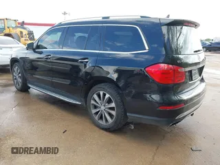 2013 Mercedes-Benz GL-Class GL 450 with VIN 4JGDF7CE4DA237229, listed as a IAAI auction lot 41912216 with 144,333 mi miles. Bid and sale history available at carsss.com. Image 3.