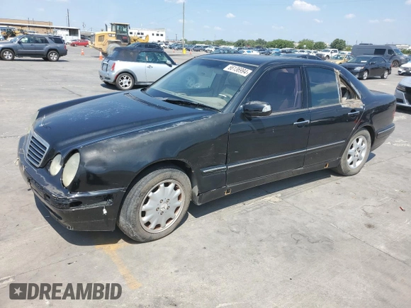 2001 Mercedes-Benz E-Class with VIN WDBJF65J01B225871, listed as a Copart auction lot 66136994 with 2,139,454 mi miles and Clean Title. Bid and sale history available at carsss.com. Image 1.