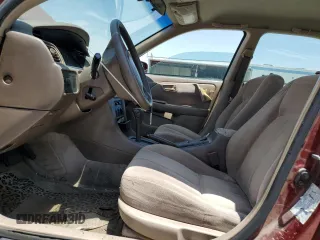 1999 Toyota Camry LE z VIN JT2BG22K6X0274398, wystawiony jako Copart lot #57263795 z przebiegiem 202 944 mil mil oraz Szkoda całkowita • Salvage title. Historia ofert i sprzedaży dostępna na DreamBid. Obrazek 7.