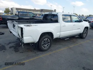 2020 Toyota Tacoma SR5 with VIN 3TMBZ5DN7LM026596, listed as a IAAI auction lot 40705410 with 123,489 mi miles and . Bid and sale history available at DreamBid. Image 4.