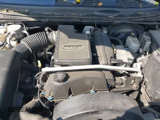 2004 Chevrolet TrailBlazer EXT LT with VIN 1GNES16S846192292, listed as a IAAI auction lot 41958602 with 125,525 mi miles. Bid and sale history available at carsss.com. Image 10.