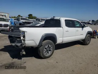2017 Toyota Tacoma SR5 with VIN 3TMDZ5BN2HM027836, listed as a Copart auction lot 57299415 with 124,255 mi miles and Salvage title. Bid and sale history available at DreamBid. Image 3.