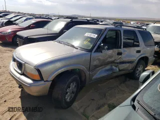 2001 GMC Jimmy SLE with VIN 1GKDT13W212223469, listed as a Copart auction lot 73249724 with 171,606 mi miles and Salvage Title. Bid and sale history available at carsss.com. Image 1.
