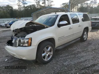2009 Chevrolet Suburban LTZ with VIN 1GNFC360X9R296302, listed as a Copart auction lot 79665234 with 176,525 mi miles and Salvage title. Bid and sale history available at DreamBid. Image 1.