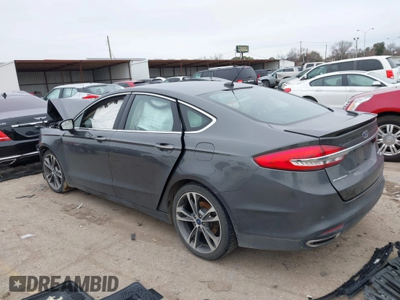 2017 Ford Fusion Titanium with VIN 3FA6P0K93HR416160, listed as a IAAI auction lot 41636451 with 100,383 mi miles. Bid and sale history available at carsss.com. Image 3.