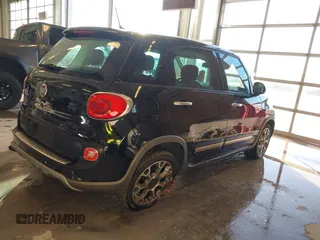 2014 FIAT 500L Trekking with VIN ZFBCFADH7EZ013366, listed as a IAAI auction lot 41017658 with 133,448 mi miles and . Bid and sale history available at DreamBid. Image 4.