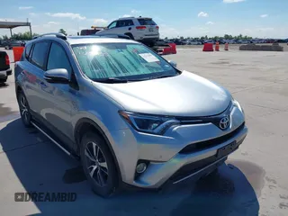 2016 Toyota RAV4 XLE z VIN 2T3RFREV7GW420732, wystawiony jako IAAI lot #42233855 z przebiegiem 125 634 mil mil oraz . Historia ofert i sprzedaży dostępna na DreamBid. Obrazek 1.