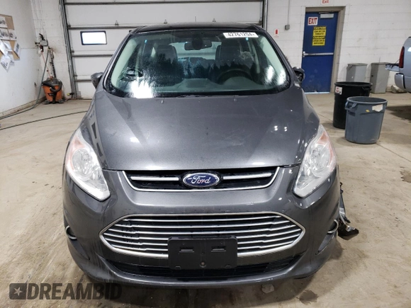 2016 Ford C-Max Energi SEL with VIN 1FADP5CU7GL113225, listed as a Copart auction lot 42761204 with 68,969 mi miles. Bid and sale history available at carsss.com. Image 5.