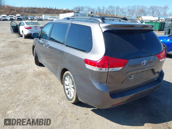 2013 Toyota Sienna XLE with VIN 5TDDK3DC6DS067612, listed as a IAAI auction lot 41756287 with 142,707 mi miles and . Bid and sale history available at DreamBid. Image 3.