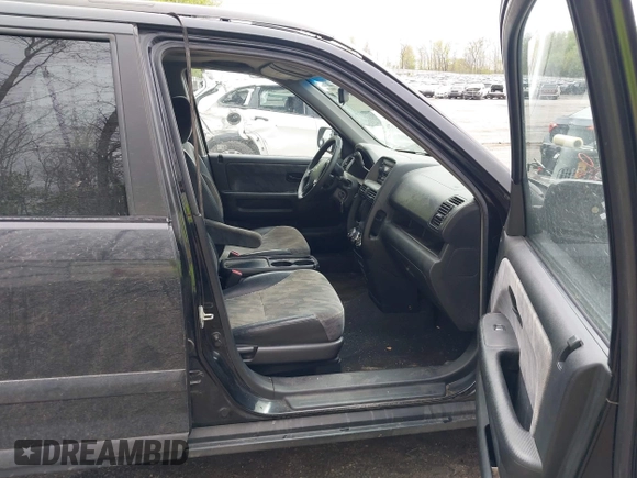 2003 Honda CR-V EX with VIN SHSRD78823U161401, listed as a IAAI auction lot 42211722 with 230,486 mi miles and . Bid and sale history available at carsss.com. Image 5.