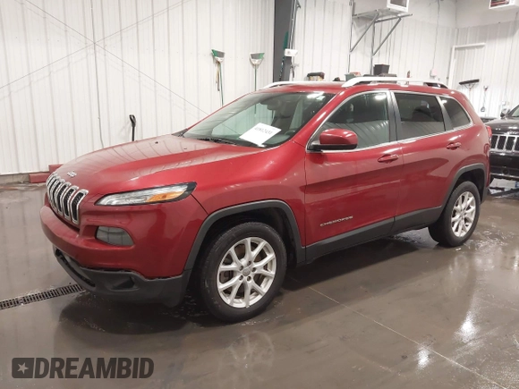 2015 Jeep Cherokee Latitude with VIN 1C4PJLCB6FW616477, listed as a IAAI auction lot 41812431 with 131,234 mi miles. Bid and sale history available at carsss.com. Image 2.