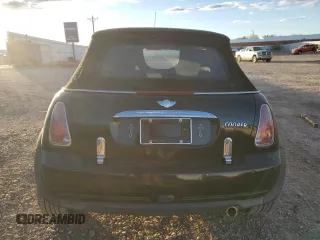 2007 MINI Convertible with VIN WMWRF33597TG16707, listed as a Copart auction lot 79104014 with 113,380 mi miles and Salvage Title. Bid and sale history available at DreamBid. Image 6.