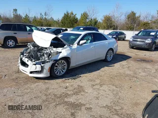 2016 Cadillac CTS Luxury Collection AWD with VIN 1G6AX5SX8G0114543, listed as a IAAI auction lot 41398389 with 114,336 mi miles and . Bid and sale history available at DreamBid. Image 2.