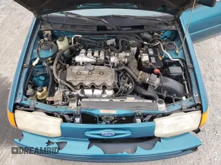 1996 Ford Escort z VIN 1FASP11J6TW170890, wystawiony jako Copart lot #49051905 z przebiegiem 133 671 mil mil oraz Czysty tytuł • Clean title. Historia ofert i sprzedaży dostępna na DreamBid. Obrazek 11.