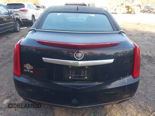 2013 Cadillac XTS Premium z VIN 2G61S5S38D9199459, wystawiony jako IAAI lot #41787638 z przebiegiem 171 298 mil mil oraz . Historia ofert i sprzedaży dostępna na DreamBid. Obrazek 16.