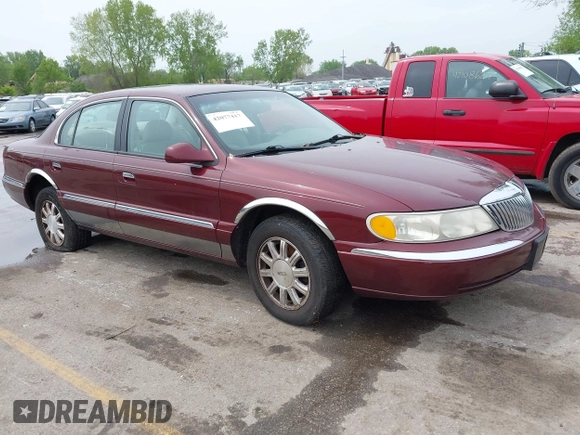 2000 Lincoln Continental with VIN 1LNHM97V5YY845447, listed as a IAAI auction lot 42077417 with 83,655 mi miles. Bid and sale history available at carsss.com. Image 1.