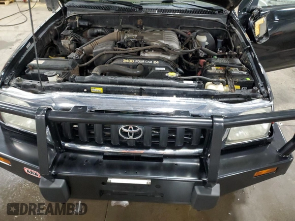 2004 Toyota Tacoma with VIN 5TEWN72N14Z424211, listed as a Copart auction lot 51815615 with 203,415 mi miles and Salvage Title. Bid and sale history available at DreamBid. Image 11.