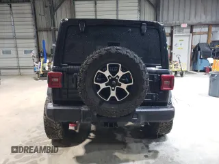 2021 Jeep Wrangler Unlimited Rubicon z VIN 1C4HJXFG7MW651772, wystawiony jako Copart lot #51651685 z przebiegiem 59 351 mil mil oraz Szkoda całkowita • Salvage title. Historia ofert i sprzedaży dostępna na DreamBid. Obrazek 6.