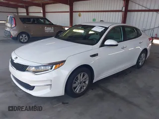 2016 Kia Optima LX with VIN KNAGT4L34G5105864, listed as a IAAI auction lot 42161194 with 106,351 mi miles. Bid and sale history available at carsss.com. Image 2.