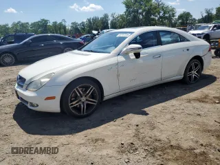 2009 Mercedes-Benz CLS 550 with VIN WDDDJ72X09A144730, listed as a Copart auction lot 62797235 with 116,924 mi miles and Salvage title. Bid and sale history available at DreamBid. Image 1.