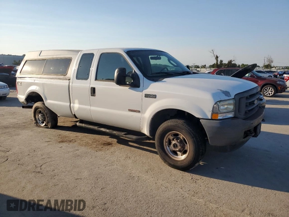 2003 Ford Super Duty F-250 XL with VIN 1FTNX21PX3ED46217, listed as a Copart auction lot 75094734 with 285,147 mi miles and Salvage Title. Bid and sale history available at carsss.com. Image 4.