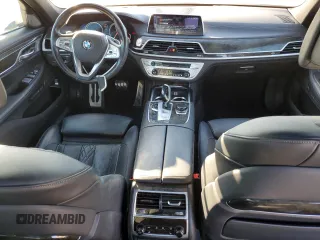 2017 BMW 7 Series 750i with VIN WBA7F0C39HGM22030, listed as a Copart auction lot 87127484 with 110,634 mi miles and Salvage title. Bid and sale history available at DreamBid. Image 8.