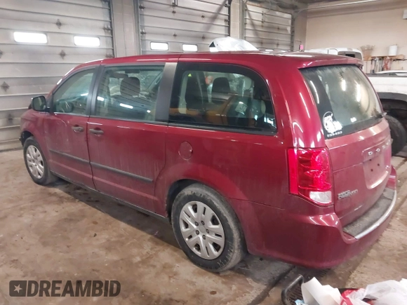 2014 Dodge Grand Caravan SE with VIN 2C4RDGBG5ER379315, listed as a IAAI auction lot 41673071 with 168,569 mi miles and . Bid and sale history available at DreamBid. Image 3.