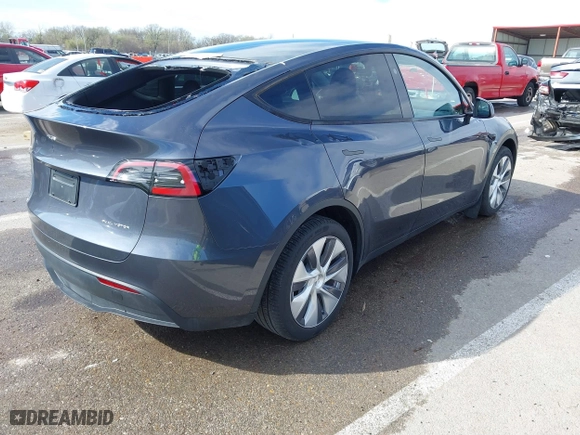 2023 Tesla Model Y Long Range with VIN 7SAYGDEE3PA204992, listed as a IAAI auction lot 41849104 with 22,490 mi miles. Bid and sale history available at carsss.com. Image 4.