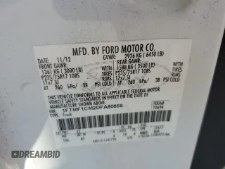 2013 Ford F-150 XL with VIN 1FTMF1CM2DFA80859, listed as a Copart auction lot 51670165 with 57,671 mi miles and Salvage title. Bid and sale history available at DreamBid. Image 14.