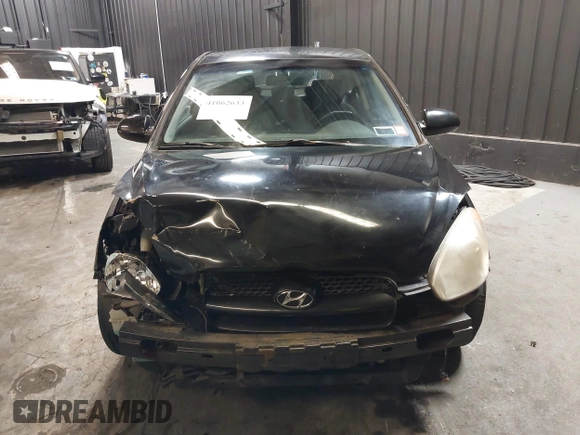 2007 Hyundai Accent SE with VIN KMHCN36C67U026540, listed as a IAAI auction lot 41062633 with 70,143 mi miles. Bid and sale history available at carsss.com. Image 13.